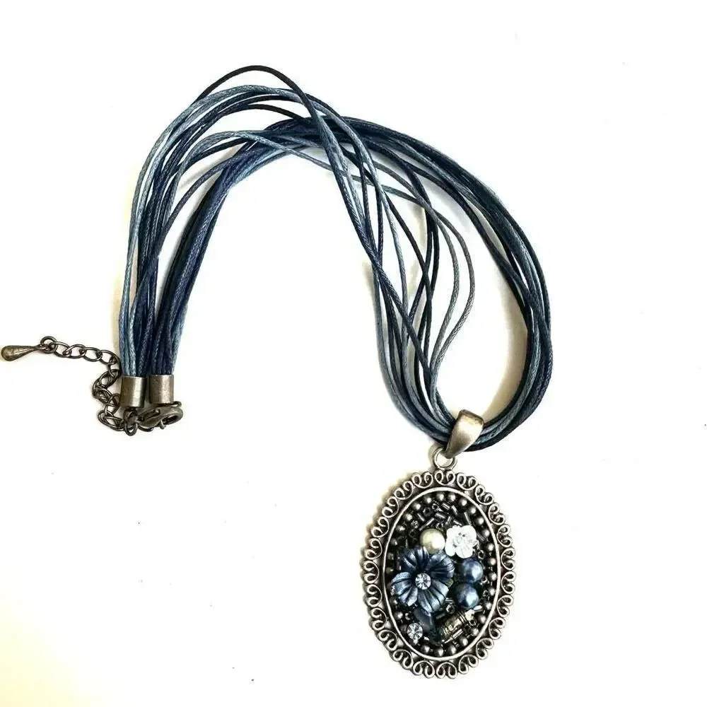 Blue floral beaded pendant necklace on multi cord